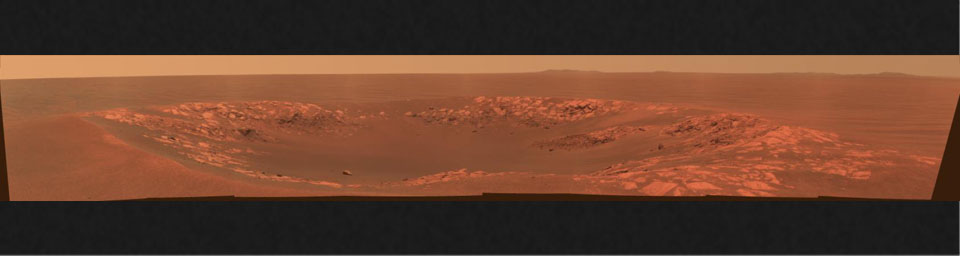 On Nov. 10, 2010, NASA's Mars Exploration Rover Opportunity took this true-color image showing 'Intrepid Crater on Mars.