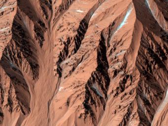 The crater shown in this image from NASA's Mars Reconnaissance Orbiter has very few craters superposed on it, which attests to its youth. It also has very steep slopes and a sharp rim; more evidence of its young age.