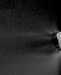 Images obtained by NASA's EPOXI mission spacecraft show an active end of the nucleus of comet Hartley 2. Icy particles spew from the surface. Most of these particles are traveling with the nucleus; fluffy 'snowballs' about 3 centimeters to 30 centimeters.