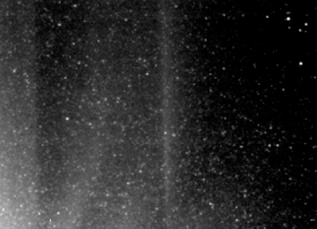 Icy particles in the cloud around Hartley 2, as seen by NASA's EPOXI mission spacecraft. A star moving through the background is marked with red and moves in a particular direction, with a particular speed; icy particles move in random directions.
