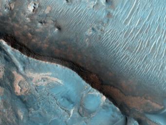 This image from NASA's Mars Reconnaissance Orbiter shows Nili Fossae region of Mars, one of the largest exposures of clay minerals, and a prime candidate landing site for Mars Science Laboratory rover, Curiosity.