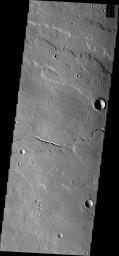 This channel is located in the volcanic flows north of Olympus Mons as seen by NASA's Mars Odyssey.