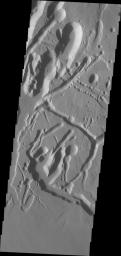 This image from NASA's Mars Odyssey shows collapse features on the southwest flank of Ascraeus Mons.