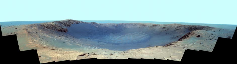 NASA's Mars Exploration Rover Opportunity spent its seventh anniversary of its landing on Mars investigating a crater called 'Santa Maria,' which has a diameter about the length of a football field.
