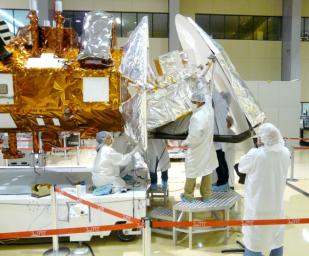 NASA's Aquarius instrument thermal blanketing is completed and inspected. In addition, all external surfaces of the satellite are cleaned and inspected with white light to uncover any visible debris.