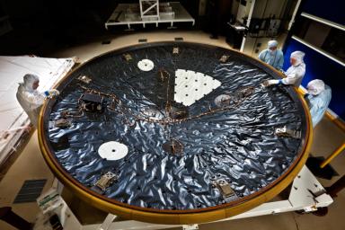 The heat shield for NASA's Mars Science Laboratory is the largest ever built for a planetary mission. This image shows the heat shield being prepared at Lockheed Martin Space Systems, Denver, in April 2011.