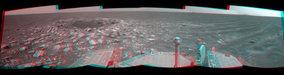 NASA's Mars Exploration Rover Opportunity captured this stereo view of a wee crater, informally named 'Skylab,' along the rover's route. This crater was likely formed within the past 100,000 years. 3D glasses are necessary to view this image.