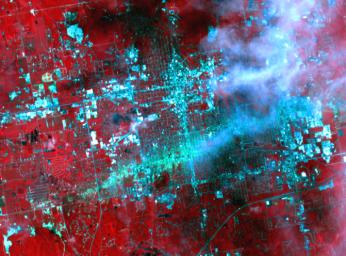 On May 30, 2011, a week after an EF-5 tornado swept through the city of Joplin, Mo, NASA's Terra spacecraft captured this image showing the track of the deadly tornado through the city (shown horizontally in green-blue).