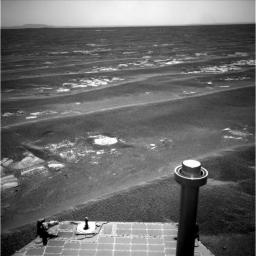 NASA's Mars Exploration Rover Opportunity used its navigation camera to record this view in the eastward driving direction after completing a drive on July 17, 2011, that took the rover's total driving distance on Mars beyond 20 miles.