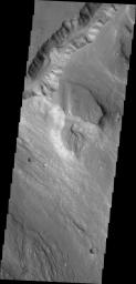 The channel at the top of this image captured by NASA's 2001 Mars Odyssey spacecraft runs between Galilaei Crater and the main channel on the northeastern side of Hydaspis Chaos.