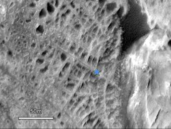 One type of feature of scientific interest on the mountain inside Gale crater is exposure of cemented fractures, evidence that groundwater once reached to at least that height of the mountain. This image is from NASA's Mars Reconnaissance Orbiter.
