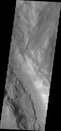 This image from NASA's 2001 Mars Odyssey spacecraft shows a small portion of Ma'adim Vallis. This channel intersects Gusev Crater, home of the Spirit Rover.