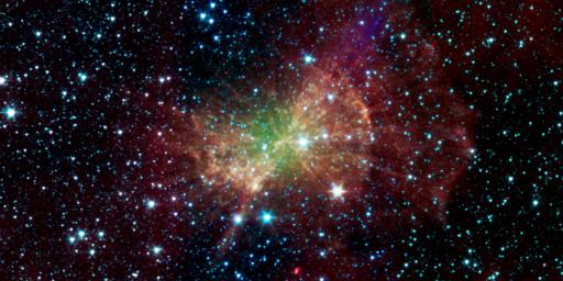The 'Dumbbell nebula,' also known as Messier 27, pumps out infrared light in this image from NASA's Spitzer Space Telescope. Planetary nebulae are now known to be the remains of stars that once looked a lot like our sun.