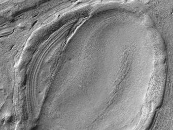 This image from NASA's Mars Reconnaissance Orbiter shows some of the weirdest and least-understood landscapes on Mars are on the floor of the deep Hellas impact basin.