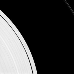 Saturn's small moon Daphnis is caught in the act of raising waves on the edges of the Keeler gap, which is the thin dark band in the left half of the image. Waves like these allow scientists to locate small moons in gaps and measure their masses.
