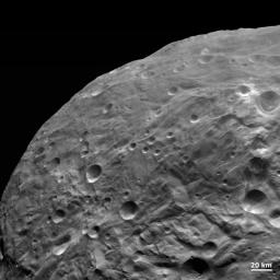 NASA's Dawn spacecraft obtained this image with its framing camera on Aug. 26, 2011. The detail in this image shows impacts of all sizes, grooves, scarps and smooth areas.