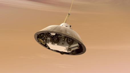This artist's concept shows NASA's Curiosity rover tucked inside the Mars Science Laboratory spacecraft's backshell while the spacecraft is descending on a parachute toward Mars. Here, the spacecraft's heat shield has already been jettisoned.