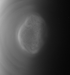 This image from a movie captured by NASA'S Cassini spacecraft shows a south polar vortex, or shows a south polar vortex, or a swirling mass of gas around the pole in the atmosphere, at Saturn's moon Titan.