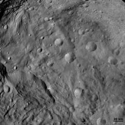 This image from NASA's Dawn spacecraft shows craters of different sizes and shapes in Vesta's southern hemisphere. The freshest craters can be classified as fresh scarp rimmed craters and the less fresh classified as partly degraded subdued rim craters.