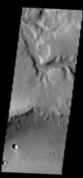 This image from NASA's 2001 Mars Odyssey spacecraft shows a small section of Naktong Vallis.