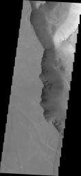 Dark slope streaks are a common feature in Noctis Labyrinthus as seen in this image captured by NASA's 2001 Mars Odyssey spacecraft.