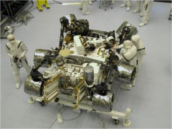 The Mars Science Laboratory mission's rover, Curiosity, is prepared for final integration into the complete NASA spacecraft in this photograph taken inside the Payload Hazardous Servicing Facility at NASA Kennedy Space Center, Fla.