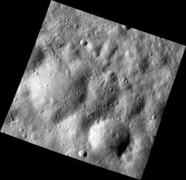 This image, one of the first obtained by NASA's Dawn spacecraft in its low altitude mapping orbit, shows many buried craters located within the equatorial trough region of the giant asteroid Vesta.