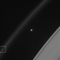 One of the glittering trails caused by small objects punching through Saturn's F ring is highlighted in this image from NASA's Cassini spacecraft. These trails show how the F ring, the outermost of Saturn's main rings, is constantly changing.