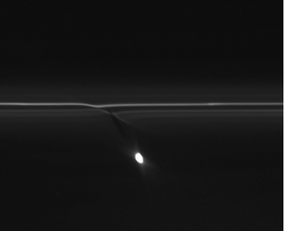 In this image from NASA's Cassini spacecraft, the gravitational pull of Saturn's moon Prometheus creates patterns in Saturn's F ring.