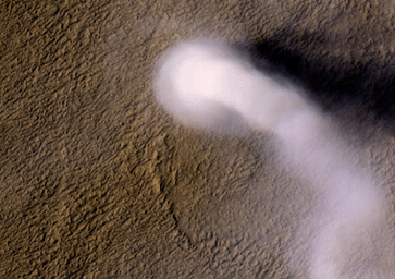 A Martian dust devil was captured winding its way along the Amazonis Planitia region of Northern Mars on March 14, 2012 NASA's Mars Reconnaissance Orbiter.