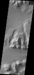 A sand sheet and dune forms are present on the floor of Capri Chasmain this image from NASA's 2001 Mars Odyssey spacecraft.