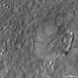 This image from NASA's Dawn spacecraft of asteroid Vesta shows Octavia crater, located in Vesta's Marcia quadrangle, just south of Vesta's equator. Octavia's rim is fresher on the right side and more degraded on the left side.