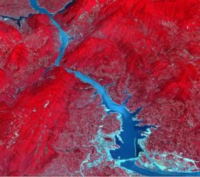 Acquired by NASA's Terra spacecraft, this image shows the Three Gorges Dam which spans the Yangtze River in east-central China, and is the world's largest power station in terms of installed capacity.