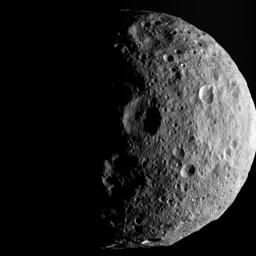The shadowy outlines of the terrain in Vesta's northern region are visible in this image from NASA's Dawn spacecraft. The image comes from the last sequence of images Dawn obtained of the giant asteroid Vesta as it departed the giant asteroid.