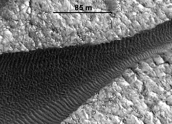 This image, one of two from a two-image animation from NASA's Mars Reconnaissance Orbiter, shows movement of ripples covering a sand dune on Mars.