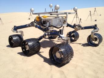 NASA's Mars Science Laboratory mission team members ran mobility tests on the test rover called 'Scarecrow' on sand dunes near Death Valley, Ca. in early May 2012 in preparation for operating the Curiosity rover, currently en route to Mars.