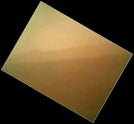 This view of the landscape to the north of NASA's Mars rover Curiosity acquired by the Mars Hand Lens Imager on the afternoon of the first day of landing. In the distance, the image shows the north wall and rim of Gale Crater.