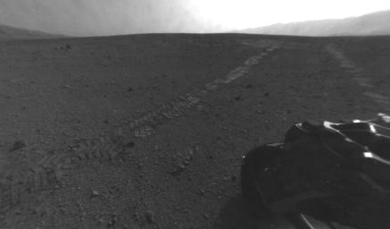 On Aug. 28, 2012, during the 22nd Martian day, or sol, after landing on Mars, NASA's Curiosity rover drove about 52 feet (16 meters) eastward, the longest drive of the mission so far. The drive imprinted the wheel tracks visible in this image.