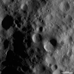 This image from NASA's Dawn spacecraft shows Fabia crater, located in asteroid Vesta's Numisia quadrangle, in Vesta's northern hemisphere.