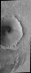 This image from NASA's Mars Odyssey spacecraft is a sand sheet with surface dune forms filling part of the floor of this unnamed crater on Mars. Many craters in the northern plains of Vastitas Borealis contain sand sheets.