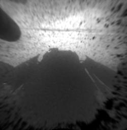 This is a version of one of the first images taken by a front Hazard-Avoidance camera on NASA's Curiosity rover. It was taken through a 'fisheye' wide-angle lens but has been 'linearized' so that the horizon looks flat rather than curved.