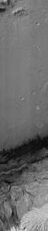 NASA's Curiosity rover and its parachute were spotted by NASA's Mars Reconnaissance Orbiter as Curiosity descended to the surface on Aug. 5 PDT (Aug. 6 EDT). Curiosity and its parachute are in the small white box at center.