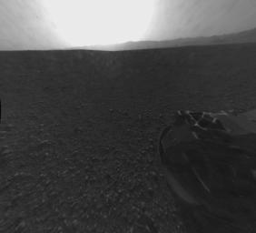 This is the full-resolution version of one of the first images taken by a rear Hazard-Avoidance camera on NASA's Curiosity rover, which landed on Mars the evening of Aug. 5 PDT (morning of Aug. 6 EDT). The image has also been cropped.