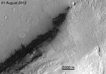 This image from an animation is from NASA's Mars Reconnaissance Orbiter (MRO) showing the landing effects of the descent stage, the rover lander, the back shell and parachute, and the heat shield, all found on the left side of the image.