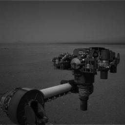 This full-resolution image from NASA's Curiosity shows the turret of tools at the end of the rover's extended robotic arm on Aug. 20, 2012. The Navigation Camera captured this view.