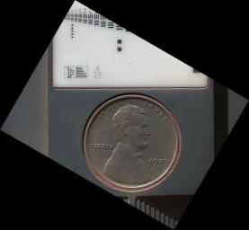 The penny in this image is part of a camera calibration target on NASA's Mars rover Curiosity. The MAHLI camera on the rover took this image of the MAHLI calibration target during the 34th Martian day of Curiosity's work on Mars, Sept. 9, 2012.