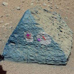 This image shows where NASA's Curiosity rover aimed two different instruments to study a rock known as 'Jake Matijevic.' The red dots are where ChemCam zapped the rock with its laser.