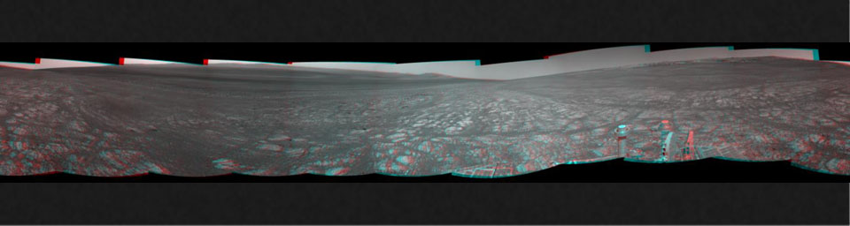 On the horizon in the right half of this panoramic view from NASA's Opportunity is an area of Mars informally named 'Matijevic Hill,' in commemoration of an influential rover-team leader. The hill includes an outcrop called Kirkwood.
