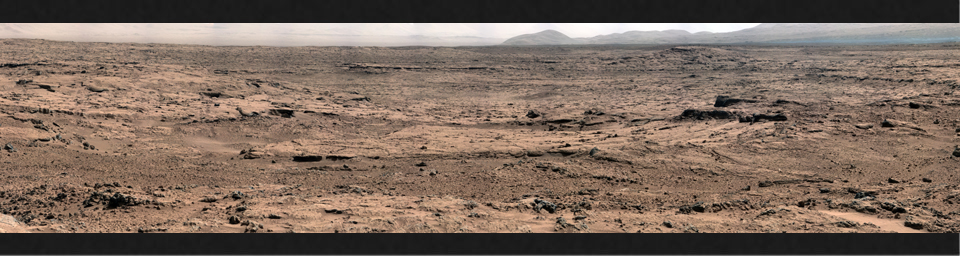The image, which has been white-balanced to show what the rocks and soils in it would look like if they were on Earth, is a mosaic of images taken at a site called 'Rocknest' while NASA's Mars rover Curiosity was working.