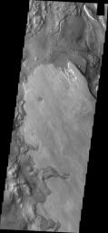 This image captured by NASA's 2001 Mars Odyssey spacecraft shows part of Aram Chaos. There are several layers of material in this region.